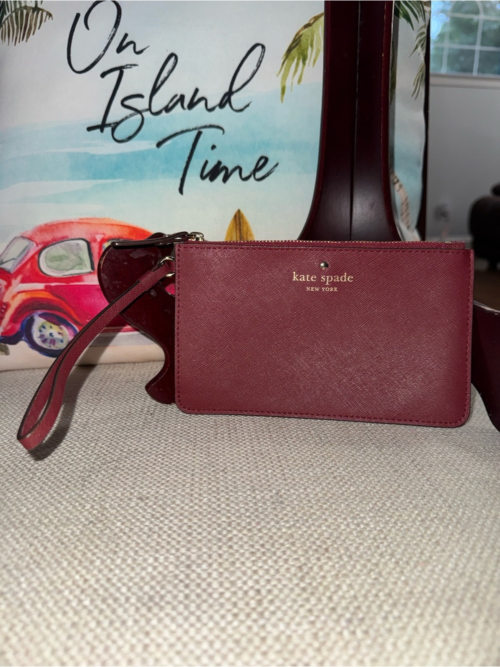 Kate Spade Cedar Street Slim Bee Wristlet In Burgundy